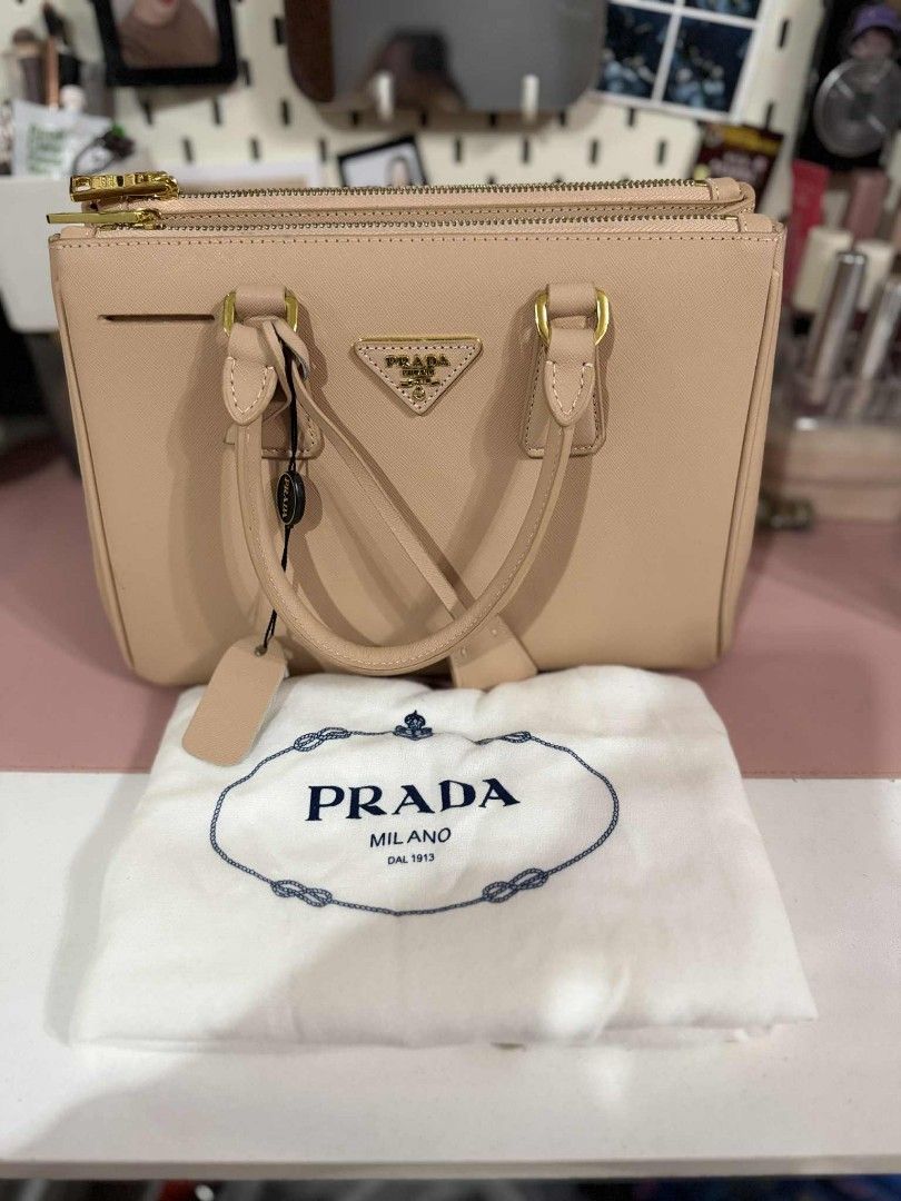 Prada Galleria (Category: Cross-body Bags) located in Caloocan City. Submitted by sandy119 (Listing ID 1374275712, Image 1). Description: never been use with dust bag with sling strap.