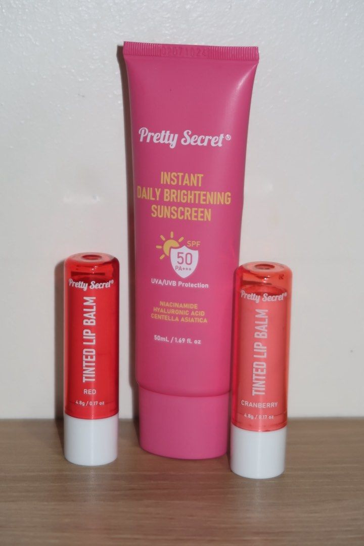 Pretty Secret Sunscreen + Lip Balm Bundle (Category: Face Care) located in Quezon City. Submitted by ellexstash (Listing ID 1374308623, Image 1). Description: Used once for a TikTok review, all items sanitized. Includes: Instant Daily Brightening Sunscreen (retails ₱349) Tinted Lip Balm in Red & Cranberry (₱94 each) Selling the bundle for ₱250 only rfs: decluttering — received as a gift.
