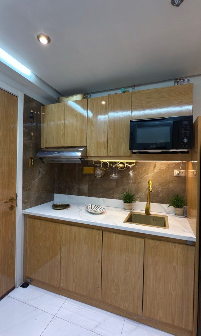 SM BLUE RESIDENCES- Ateneo (Category: Apartments & Condos) located in Quezon City. Submitted by dadaelii (Listing ID 1374276333, Image 2). Description: I’m selling my Fully Furnished Deluxe Condo Unit because I am relocating because of work. Located on the same floor as all amenities—swimming pool, private lounge, study area, and function hall—it’s incredibly convenient. This unit has been recently renovated and customized to match my style, feat