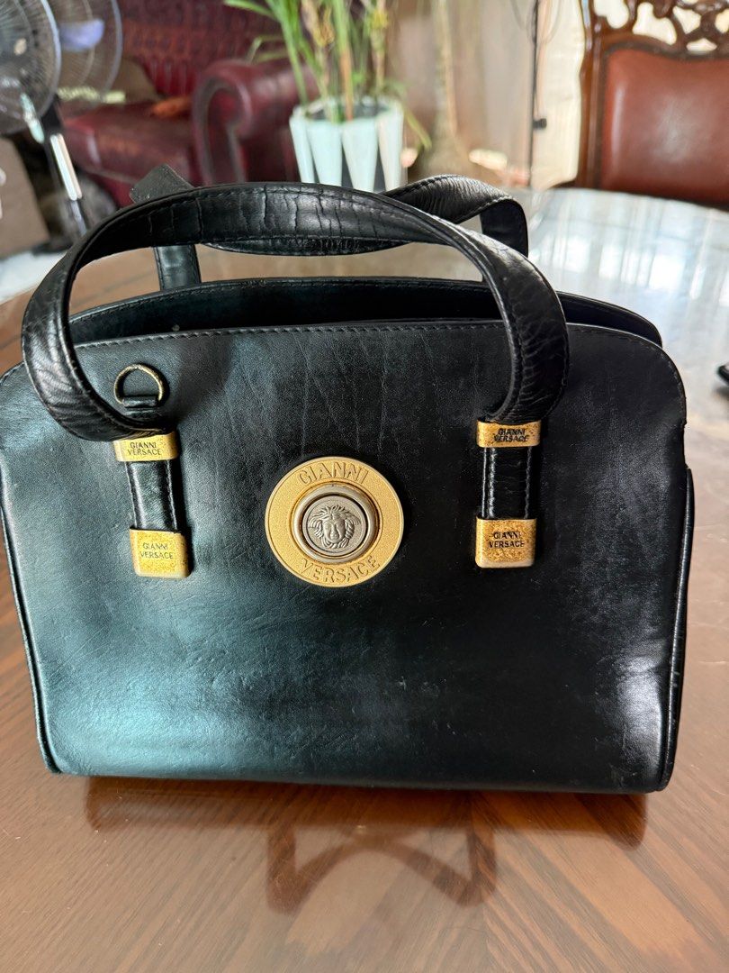 Top Handle Gianni Versace (Category: Luxury Bags & Wallets) located in Quezon City. Submitted by fabulousdealsbhl (Listing ID 1374168093, Image 1). Description: Well used very elegant top handle Gianni Versace bag. Selling it for only Php2000 + Shipping Fee .