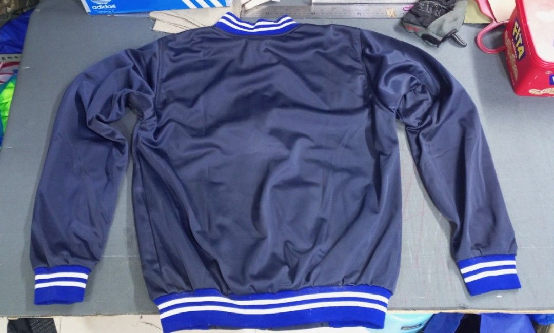 Varsity Jacket (Category: Activewear) located in Manila. Submitted by esteemed_shop (Listing ID 1374203415, Image 2). Description: 🧥 Slide 1: Classic Varsity Style, Elevated Step into timeless fashion with our Navy Blue Varsity Jacket – a perfect blend of vintage athletic vibes and modern streetwear flair. 💙 Slide 2: Premium Comfort Crafted with high-quality, smooth fabric for a sleek feel and lasting comfort. Lightweight but warm – ideal for s