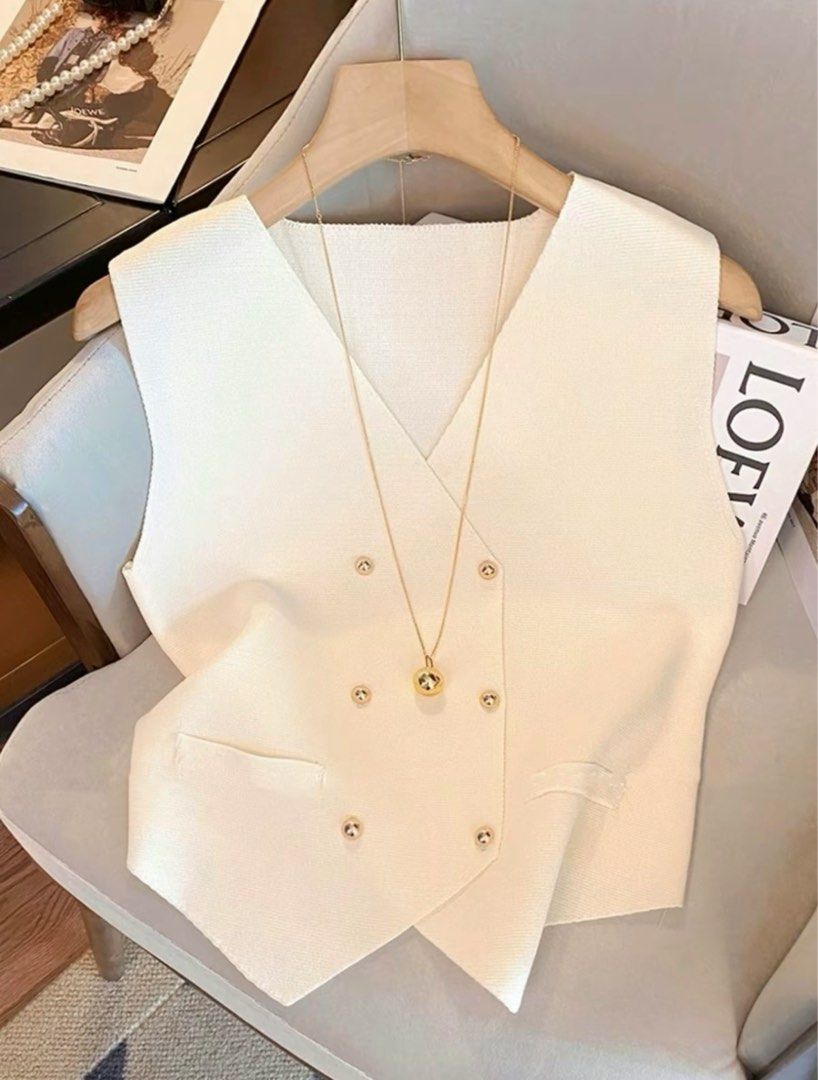 White Old Money Classy Knitted Vest Top (Category: Blouses) located in Muntinlupa City. Submitted by gelune (Listing ID 1374292099, Image 1). Description: .