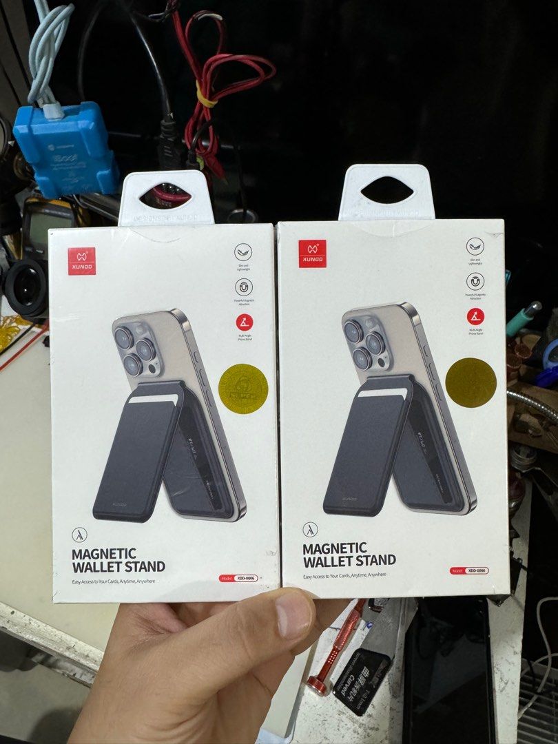XUNDD XDD-0006 Magnetic Wallet Stand (Category: Mounts & Holders) located in Makati City. Submitted by jc.cuerdo (Listing ID 1374302011, Image 1). Description: XUNDD XDD-0006 Magnetic Wallet Stand Colour：Black Specification： ①Selected high quality leather material ②Reinforced magnetic design ③Can be used as a stand ④Convenient extraction.