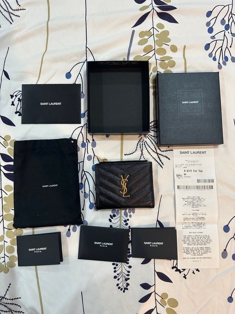 YSL Monogram Bifold Wallet (Category: Luxury Bags & Wallets) located in Caloocan City. Submitted by mnl.seconds (Listing ID 1374144841, Image 1). Description: Bought from Tokyo All inclusions still intact including paper bag Gift receipt from the store still included Super seldom used Rfs: i want a new bag.