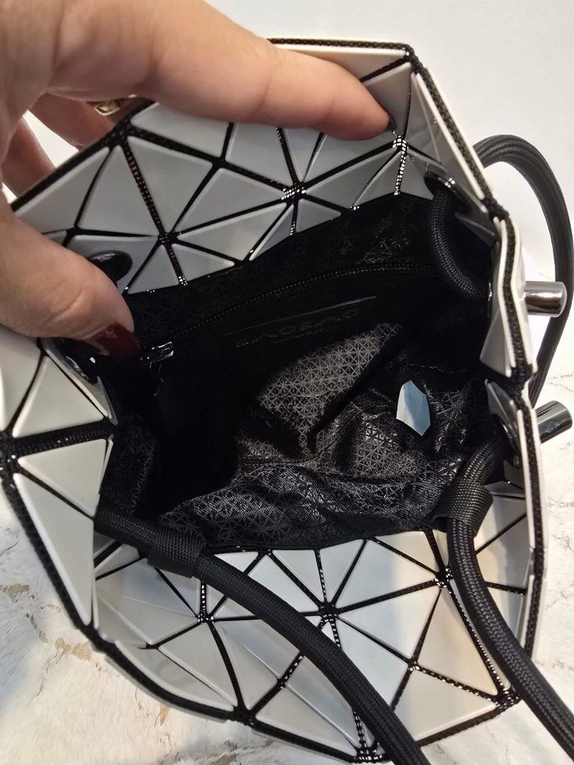 Authentic BaoBao Bucket bag (Category: Luxury Bags & Wallets) located in Quezon City. Submitted by jhaediah (Listing ID 1374327205, Image 3). Description: - Authentic 💯 - Baobao Bucket Bag - Small size - Looks new 😍 gandara in actual 😍 .