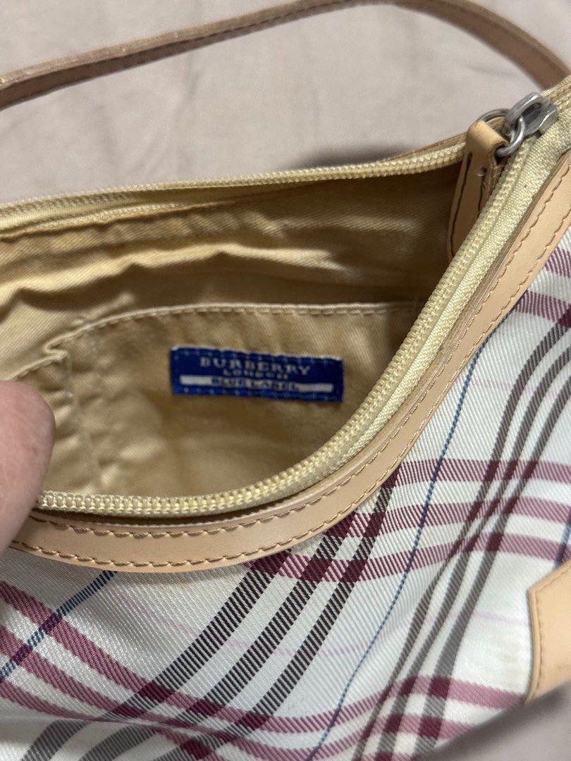 Authentic Burberry Pochette Baguette (Category: Luxury Bags & Wallets) located in Cainta. Submitted by jhobreggy (Listing ID 1374408793, Image 3). Description: Bought from an online second hand bags store Please see pictures for details and flaws.
