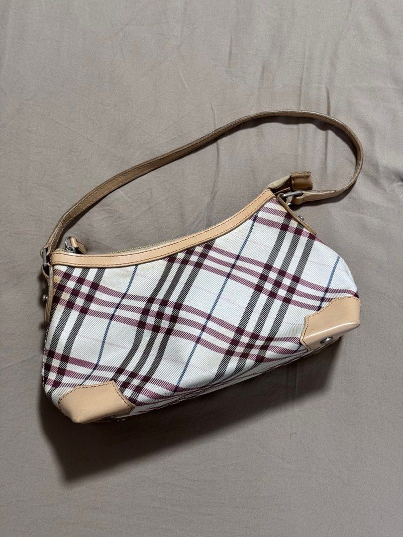Authentic Burberry Pochette Baguette (Category: Luxury Bags & Wallets) located in Cainta. Submitted by jhobreggy (Listing ID 1374408793, Image 1). Description: Bought from an online second hand bags store Please see pictures for details and flaws.