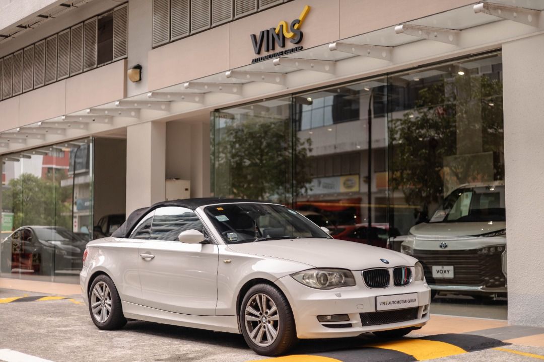 BMW 1 Series 120i Cabriolet (Category: Used Cars) located in Singapore. Submitted by vinsautogroup (Listing ID 1374376699, Image 1). Description: Vehicle Features Consignment Unit. Powered By 2.0L Inline 4 Engine Producing 154bhp, 210m Torque Mated To 6 Speed Auto Transmission, RWD, SRS Airbags. Accessories Auto Bi-Xenon Lights. Auto Rain Sensing Wipers. Electric Memory Seats. Electric Lumbar Support/adjustment Seats. Remote Boot Release. Parking