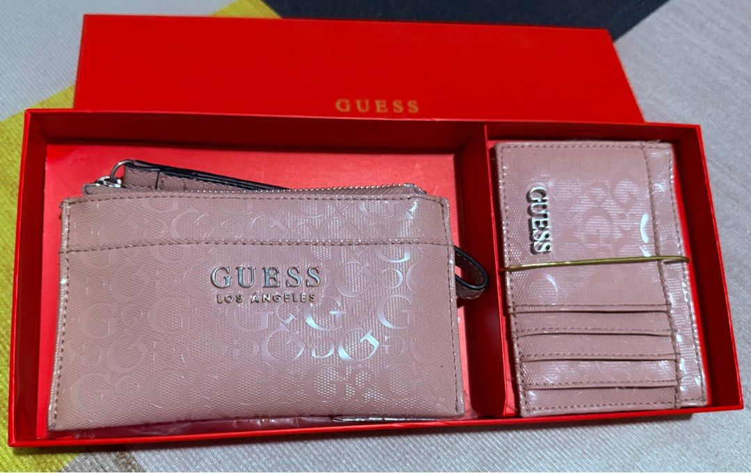 Guess wallet and card holder set (Category: Wallets & Card holders) located in Cavite. Submitted by yapee. (Listing ID 1374431631, Image 1). Description: Like new, used only once In very good condition Color light pink.
