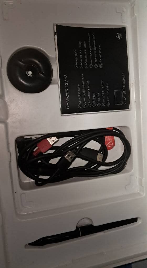 HUION Kamvas 13 Creative Pen Display (Category: Laptops & Notebooks) located in Carmona. Submitted by vivienecontemprato (Listing ID 1374343932, Image 2). Description: Condition: Used (with visible screen protector marks, some packaging wear) What’s included: - HUION Kamvas 13 Pen Display - Battery-free stylus (Pen) - Pen holder with spare nibs - USB cables (2-in-1 HDMI, USB-A to USB-C with red marking) - Quick Start Guide (Kamvas 12/13) - Origin