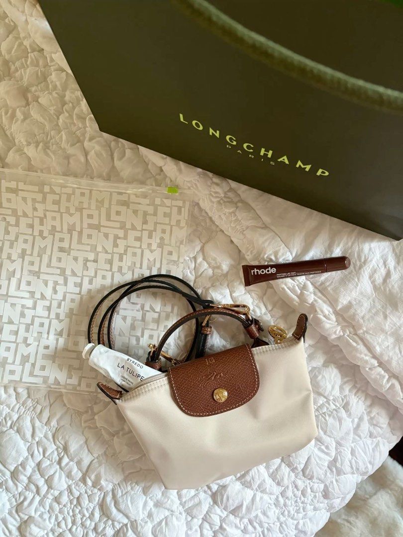 Longchamp Mini With STRAPS (Category: Luxury Bags & Wallets) located in Manila. Submitted by _girlfinds (Listing ID 1374354435, Image 1). Description: 👜 LONGCHAMP LE PLIAGE – JAPAN SOURCED Elevate your daily style with this classic and functional Longchamp tote. 📍 Sourced directly from Japan – self authentication with the provided photos, premium quality. 🚫 No cancellation of orders 🛑 Low-ballers = blocked 🛍️ If unsure, feel free to purchase