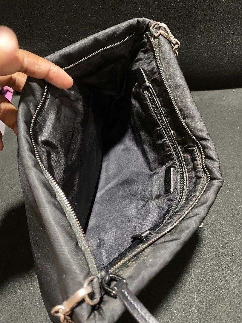 Prada sling chain bag (Category: Luxury Bags & Wallets) located in Baguio. Submitted by fullroom.dgs (Listing ID 1374510750, Image 3). Description: Prada sling chain bag excellent condition authentic please check photos.