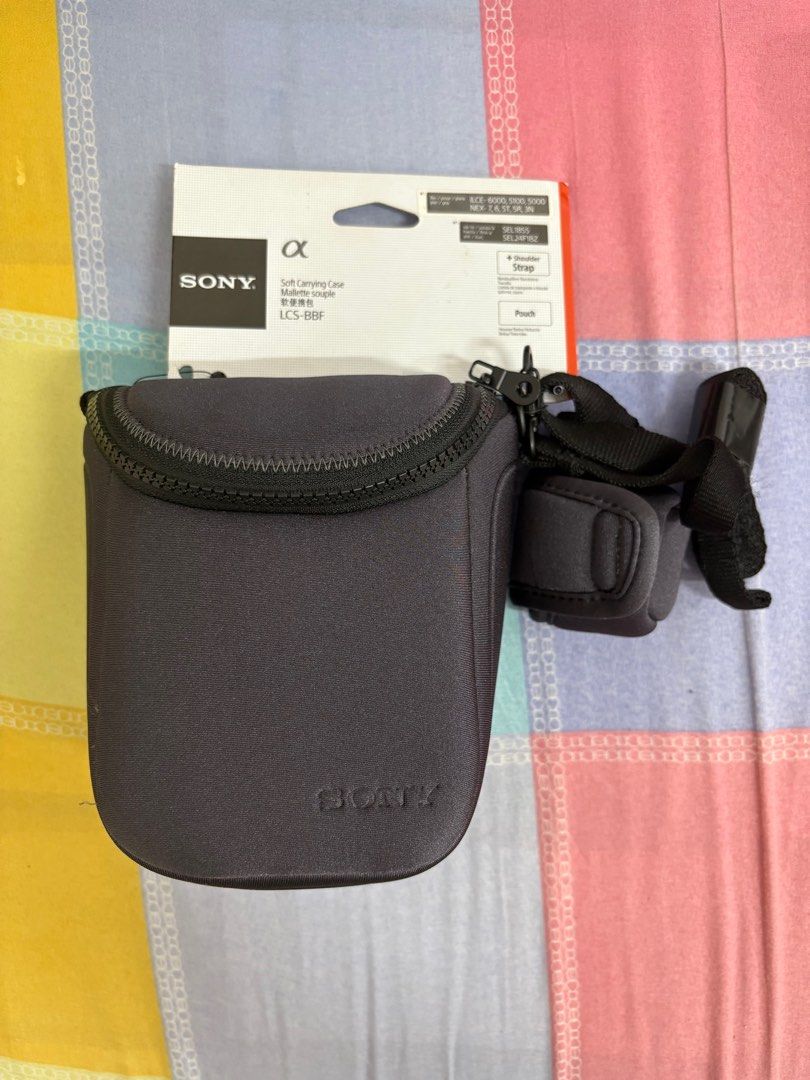 Sony Soft Carrying Case / LCS-BFF (Category: Camera Bags & Carriers) located in Manila. Submitted by ayaselling (Listing ID 1374460878, Image 1). Description: This product is compatible with the following Sony mirrorless cameras: • ILCE-6000, 5100, 5000 (Sony Alpha a6000 series) • NEX-7, 6, 5T, 5R, 3N (Older Sony NEX mirrorless models) Included Accessories: Shoulder Strap and pouch.