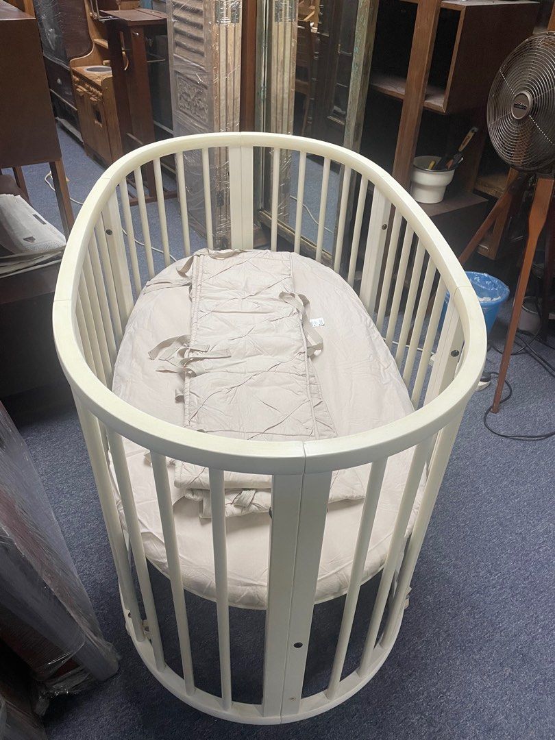 Stokke Sleepi Cot (Category: Cots & Cribs) located in Singapore. Submitted by Soe_Vintage (Listing ID 1374438070, Image 2). Description: Original Stokke Sleepi cot Suitable for newborn to 4 year old The cot grows with the child with 4 adjustable high NO mattress, just the cot only Well used in well maintained condition with normal signs of usage..