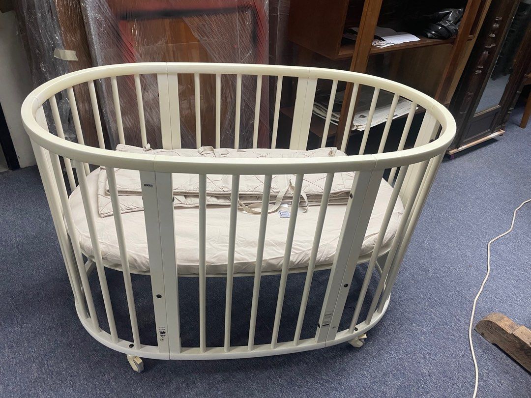 Stokke Sleepi Cot (Category: Cots & Cribs) located in Singapore. Submitted by Soe_Vintage (Listing ID 1374438070, Image 1). Description: Original Stokke Sleepi cot Suitable for newborn to 4 year old The cot grows with the child with 4 adjustable high NO mattress, just the cot only Well used in well maintained condition with normal signs of usage..