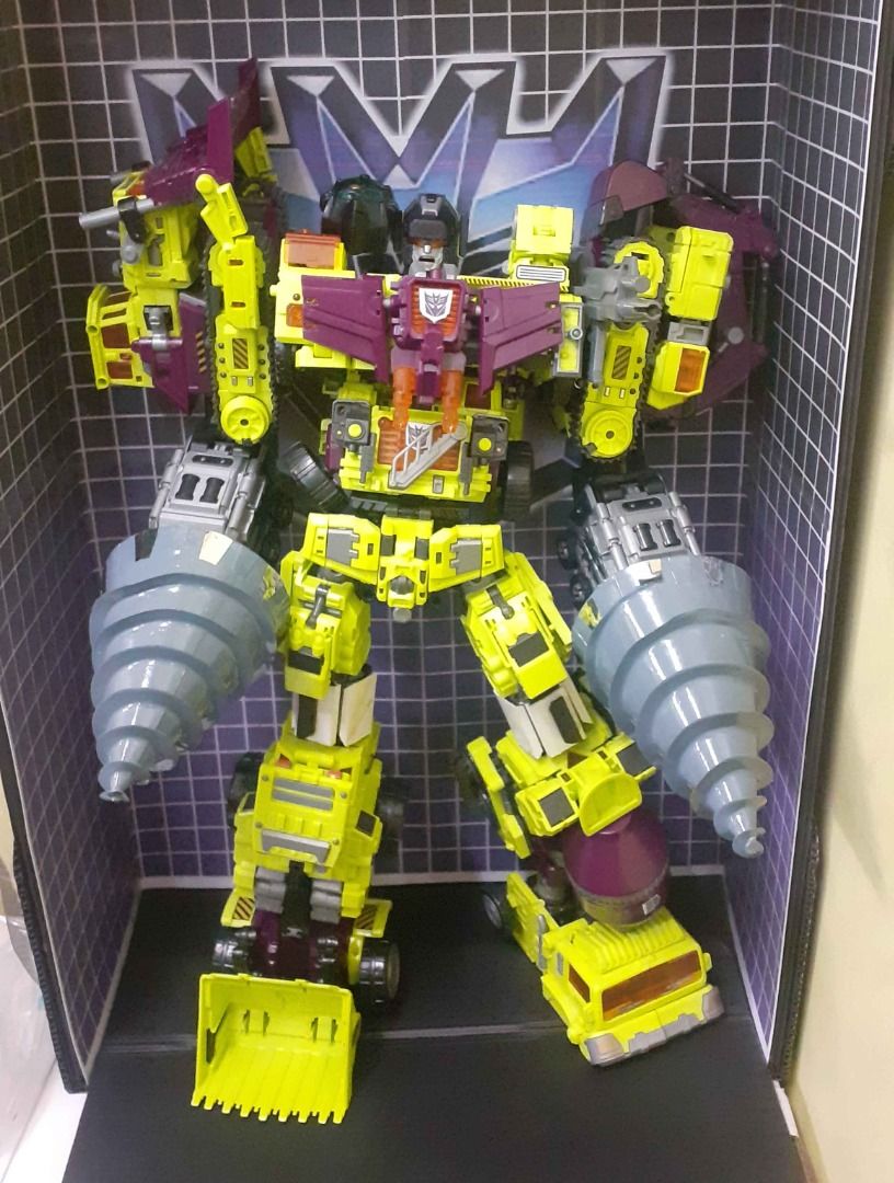 transformers Devastator NBK (Category: Action & Battle Toys) located in Quezon City. Submitted by snakeeyes1873820201 (Listing ID 1374421292, Image 2). Description: FS: NBK Transformers devastator DIY LEG upgarde unpainted, diy drills issue : one broke finger missing. 2 tip rocket like on chest plate starscream not included.