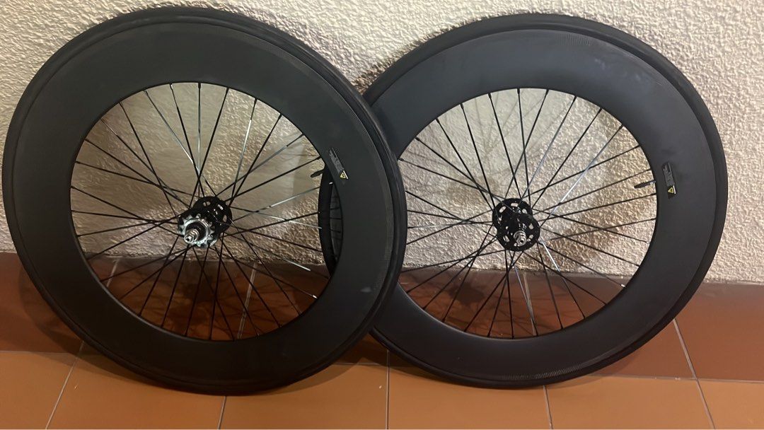 88mm Carbon wheelset wtt/wts (Category: Bicycles) located in Singapore. Submitted by niggatroooin (Listing ID 1374665849, Image 1). Description: 88mm carbon Laced to novatech 13T Fd 400 No axle problem.