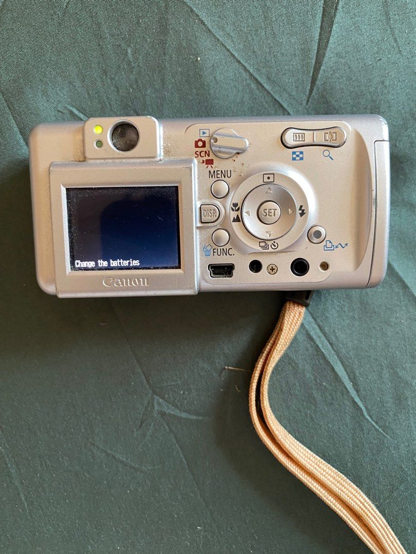 Canon PowerShot A400 – Vintage Digital Camera (3.2 MP) (Category: Cameras) located in Cavite. Submitted by namiikeii (Listing ID 1374520227, Image 2). Description: Selling my Canon PowerShot A400 – still turns on and can be used for basic shots or as a vintage/retro camera. 📷 Specs: 3.2 Megapixels 2.2x Optical Zoom Takes SD cards and AA batteries 🎁 Inclusions: Camera unit only ❗Condition: Used, with minor scratches, but still powers on. Great f