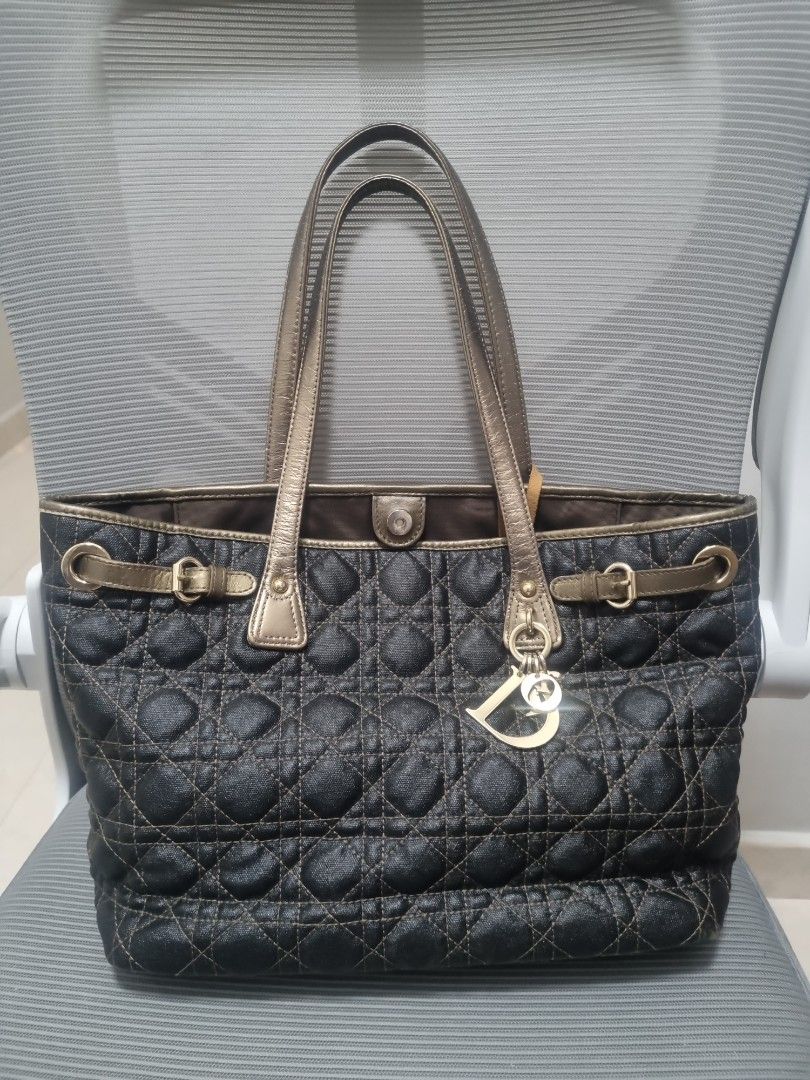 Dior Panarea Black Tote with gold Hardware (Category: Bags & Wallets) located in Singapore. Submitted by Godbless (Listing ID 1374647046, Image 1). Description: dior black quilted tote with gold charms. top length 40cm, base length 32cm height 25cm base width 15cm come witth original dior dustbag, signs of use on handle strap.