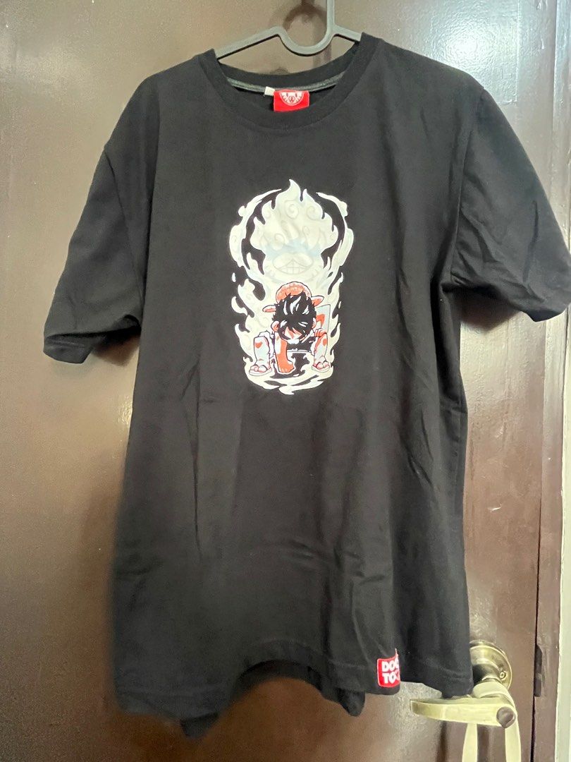 Doodle Toons Shirt One Piece L (Category: Tshirts & Polo Shirts ) located in Muntinlupa City. Submitted by chinggg2 (Listing ID 1374566778, Image 1). Description: Original Doodle Toons Black One Piece Shirt Large size Flaw: open seam on tag - please see photos .