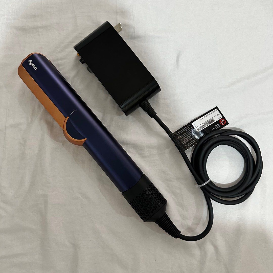 Dyson Airstrait (Category: Hair) located in Manila. Submitted by dodebelen (Listing ID 1374536850, Image 1). Description: DYSON Airstrait Php27,000 RFS: may Dyson Airwrap din ako Original Price: Php33,900 Condition: Used a few times, parang brand new Color: Prussian Blue Purchased from: Dyson Greenbelt Store Inclusions: 1. Dyson Airstrait 2. Box 3. Store Receipt 4. Heat Resistant Mat.
