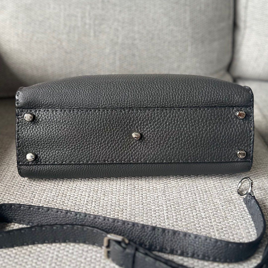 FENDI Peekaboo Medium - Gray (Category: Luxury Bags & Wallets) located in Paranaque City. Submitted by megsluxefinds (Listing ID 1374549627, Image 2). Description: IG: @megsluxfinds FENDI Peekaboo Medium - Gray Rank SA ₱115,000 Comes with care cards and raincoat Quiet luxury at its finest. Crafted from supple leather and finished with hand-stitched detailing, the Fendi Peekaboo is a timeless icon of understated elegance. Spacious, structured, and