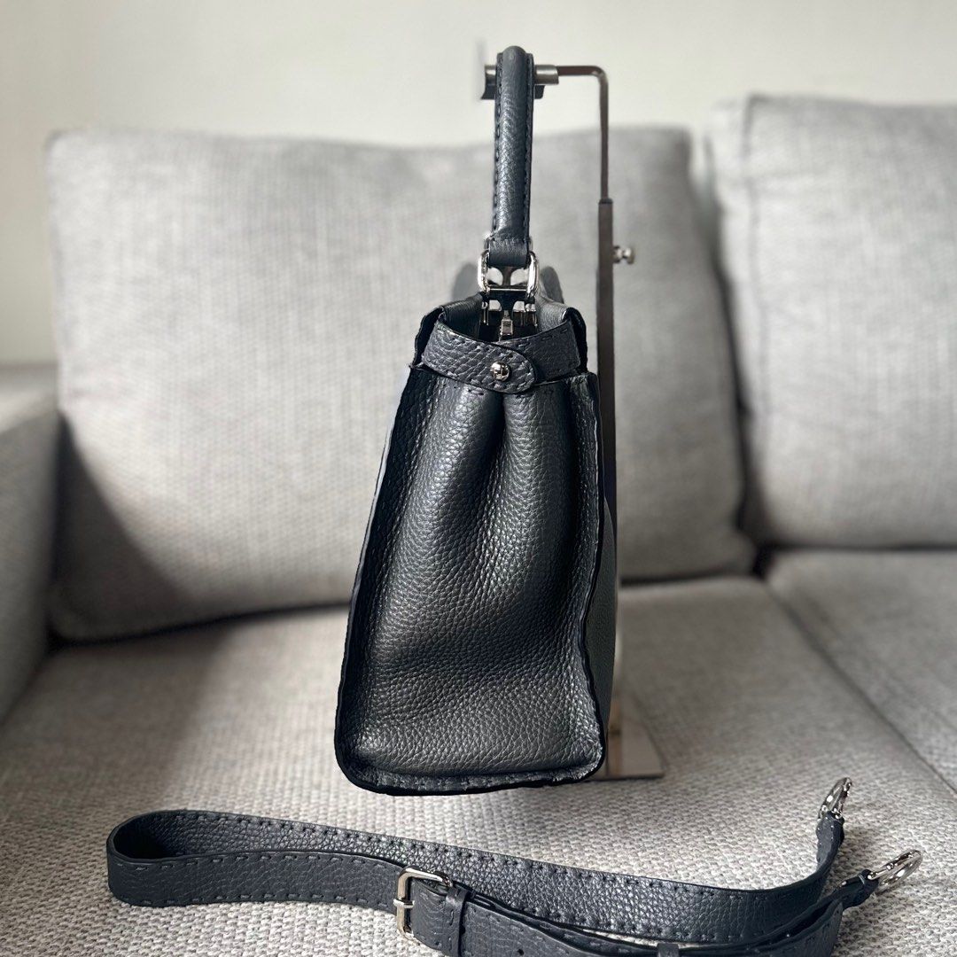 FENDI Peekaboo Medium - Gray (Category: Luxury Bags & Wallets) located in Paranaque City. Submitted by megsluxefinds (Listing ID 1374549627, Image 3). Description: IG: @megsluxfinds FENDI Peekaboo Medium - Gray Rank SA ₱115,000 Comes with care cards and raincoat Quiet luxury at its finest. Crafted from supple leather and finished with hand-stitched detailing, the Fendi Peekaboo is a timeless icon of understated elegance. Spacious, structured, and
