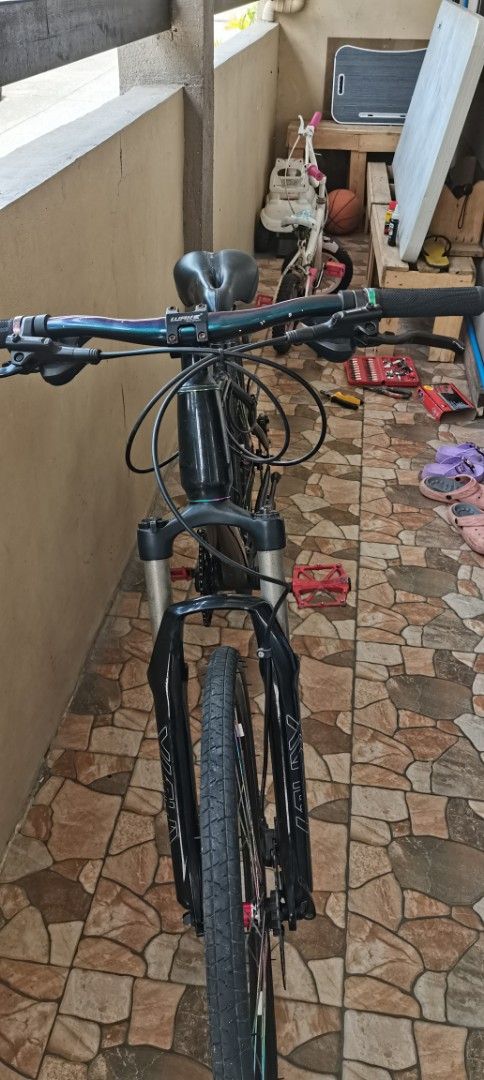 For sale MTB 27.5 (Category: Bicycles) located in Dasmarinas. Submitted by roydms (Listing ID 1374589579, Image 1). Description: For sale:Mountain bike 27.5 Matte frame(metal) meduim Shimano tourney 3x12 8 speed Velo saddle Wake handle post Maxzone pedal GUB 3Pawls Hub w/quick release pin Alloy rim set tricolor spokes Working shock forgetten the brand Shimano hydrolic disc brake Alloy low riser handle bar w/rubber hand grip With FREE baby bike ca