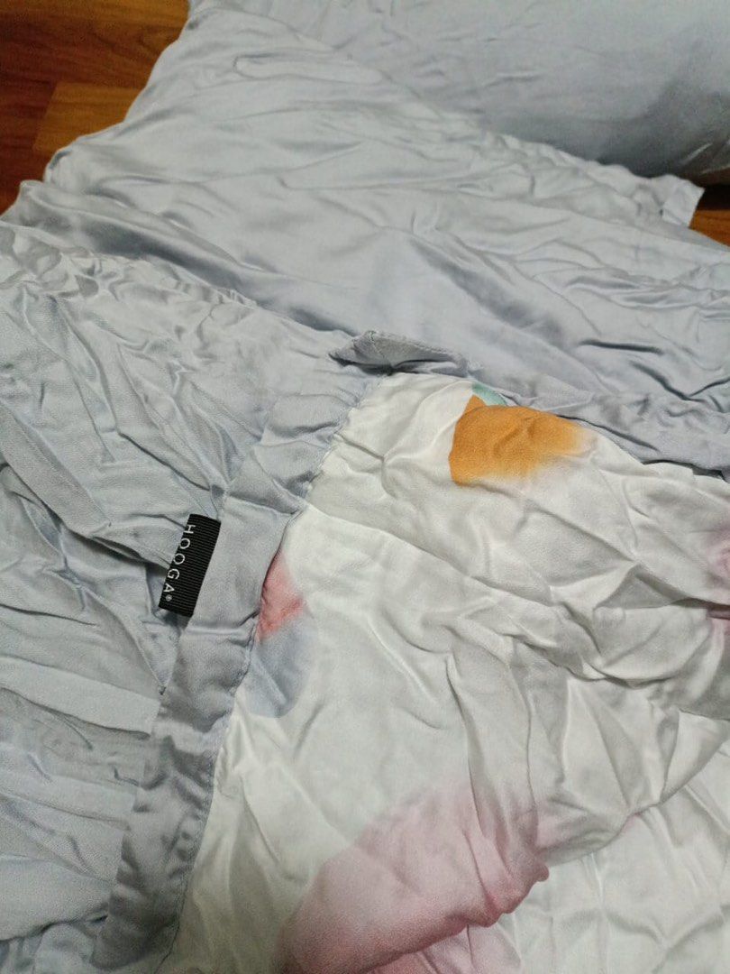 Hooga Tencel Queen Duvet Cover + Bedsheet + Pillowcase + Bolster Case (Category: Bedding & Towels) located in Singapore. Submitted by slnloo05371 (Listing ID 1374677463, Image 2). Description: Cooling tencel fabric. Still in new condition.