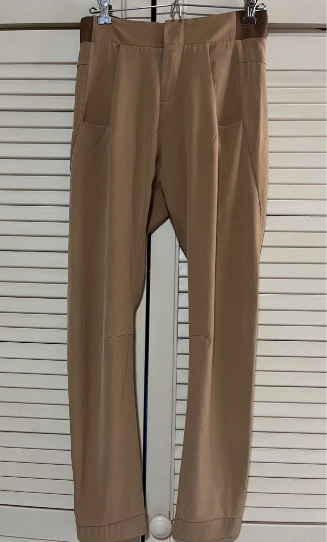 IGC ladies Pant (Category: Other Bottoms) located in Singapore. Submitted by matchatang (Listing ID 1374549013, Image 1). Description: This stylish pant are made from lightweight easy care and are adaptable to suit a range of body type. It has an elastic waist bands on both sides completed with sides pockets. Brand new not worn at all. Measurement: Waist 38 cm Hip. 46 cm Length 95 cm.