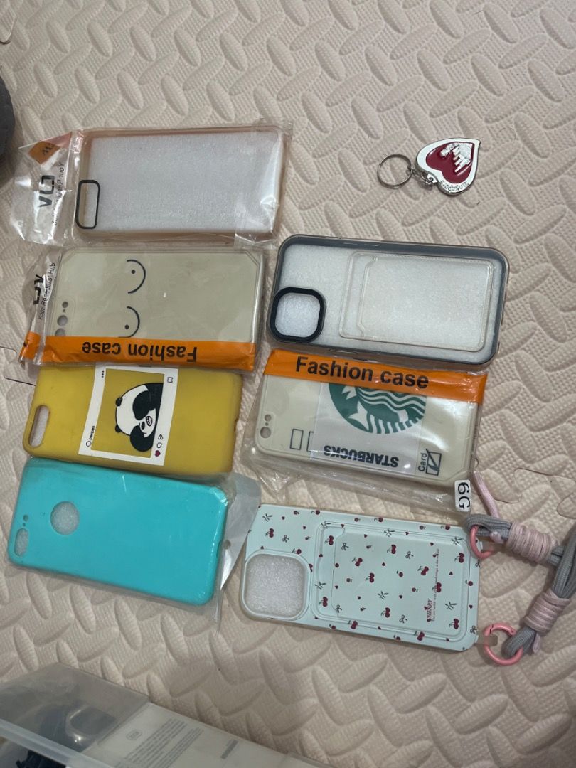 Ip 6, 7plus, 13, 13 pro cover cases (Category: Cases & Sleeves) located in Muntinlupa City. Submitted by keenlion_22f510 (Listing ID 1374656609, Image 1). Description: Iphone 6(starbucks), upper part 4 cases iphone 7 plus, iphone 13pro cherry, iphone 13 black and transparent w/ card holder 100 take all.