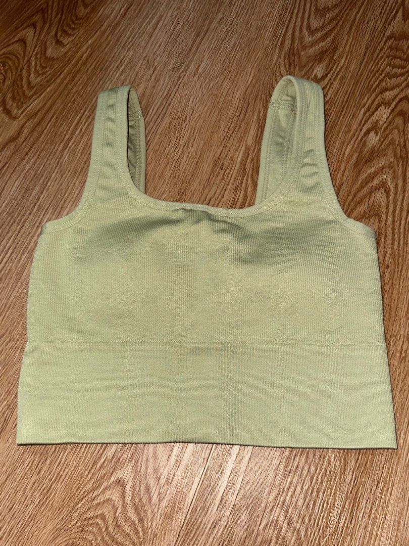 Urban Outfitters Light Green Workout Top (Category: Activewear) located in Manila. Submitted by decluttering77 (Listing ID 1374526037, Image 1). Description: - 10/10 condition, no flaws - padded - sports bra top - bought in the US - fits size s MOP: GCASH *will not ship unless fully paid.