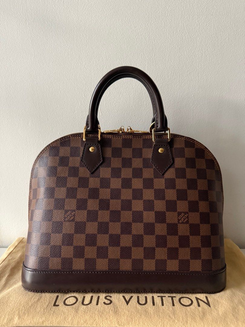 Louis Vuitton Alma PM (Category: Luxury Bags & Wallets) located in Cebu City. Submitted by simplyjoyce (Listing ID 1374625017, Image 2). Description: Preloved LV Alma PM in Damier Ebene Canvas at 78,000php complete inclusions. Excellent condition. Cash / Lay-away. #sjccebulv #lvalma #lvalmapm.