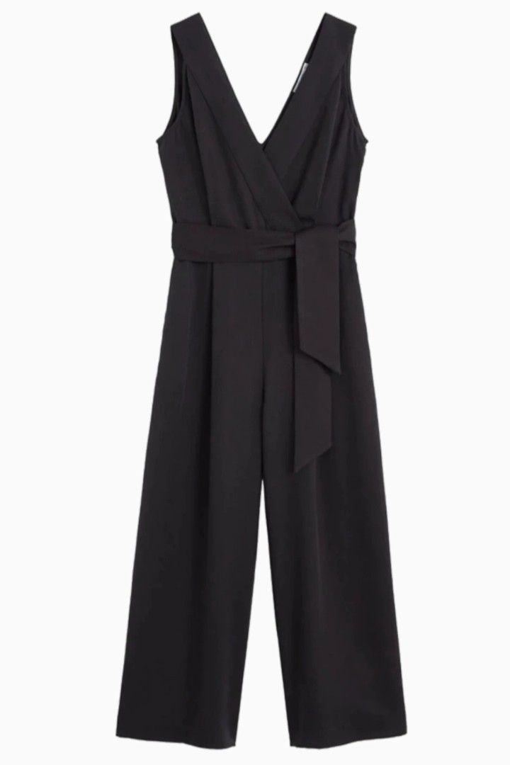 Mango Open Back Jumpsuit (Category: Jumpsuits) located in Quezon City. Submitted by six_half (Listing ID 1371452597, Image 1). Description: Fits XS frames Cup A-B No pockets With Waist Belt Measurements Laid Flat: Bust: 15" Waist: 12.5" Length: 50".