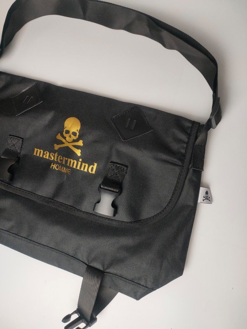 Mastermind Japan MMJ Messenger Bag Shoulder Bag (Category: Backpacks) located in Manila. Submitted by 1702finest (Listing ID 1374552510, Image 3). Description: Mastermind Japan MMJ Messenger Bag Shoulder Bag -Clean design with durable buckles and nylon material. Great condition, Rare piece. Refer to the photos and the description to understand the condition of the item. Dimension in inches Height 10 Width 16 Shoulder strap can stretch up to 42 in