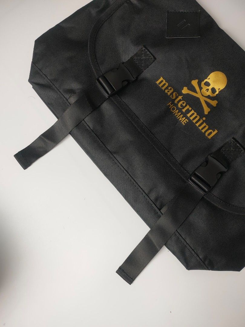 Mastermind Japan MMJ Messenger Bag Shoulder Bag (Category: Backpacks) located in Manila. Submitted by 1702finest (Listing ID 1374552510, Image 2). Description: Mastermind Japan MMJ Messenger Bag Shoulder Bag -Clean design with durable buckles and nylon material. Great condition, Rare piece. Refer to the photos and the description to understand the condition of the item. Dimension in inches Height 10 Width 16 Shoulder strap can stretch up to 42 in