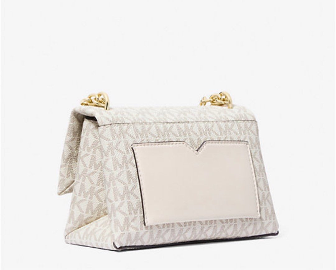 Michael Kors Cece Small Logo Shoulder Bag (Category: Luxury Bags & Wallets) located in Manila. Submitted by urbantrendsetter (Listing ID 1374659843, Image 2). Description: Srp $365 = 20k pesos Selling it almost 60% off One bag, many occasio the Signature-print Cece defines everyday sophistication. Designed in a fold-over silhouette with gleaming hardware and a lock-and-key detail, it’s sized to hold all your daily essentials. • Shoulder bag • Log