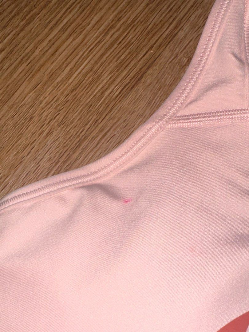 Nike Light Pink Sports Bra (Category: Activewear) located in Manila. Submitted by decluttering77 (Listing ID 1374522056, Image 2). Description: - 9/10 condition. has a pink sharpie dot but other than that, its in super good condition - original, authentic product - size s on tag - padded but can be removed MOP: Gcash, GoTyme *will not ship unless fully paid.