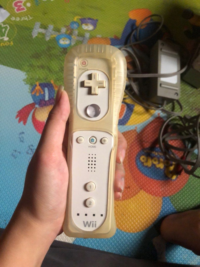 nintendo wii remote controller (Category: Nintendo) located in Manila. Submitted by esmiexhu (Listing ID 1374604004, Image 1). Description: perfectly working. Free Nunchuck and 3 wii mote protection/ cover.