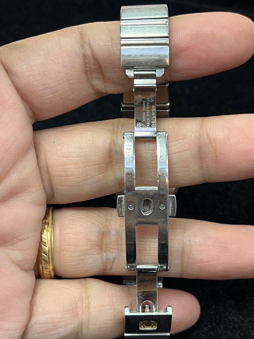 OMEGA Constellation Silver Dial Ladies’ Watch (Category: Luxury Watches) located in Taguig. Submitted by mhalet.902 (Listing ID 1374571100, Image 3). Description: Gender: Ladies’ Reference #: 795.1001 Movement: Quartz Case Size: 25mm Case Material: Stainless steel Strap Size: 5” / 6.1” (with face) Crystal: Sapphire Water Resistance: 100m Dial Type/Color: Analog/Silver Band Type: Bracelet Band Material: Stainless steel Clasp: Butterfly Inclusion: 