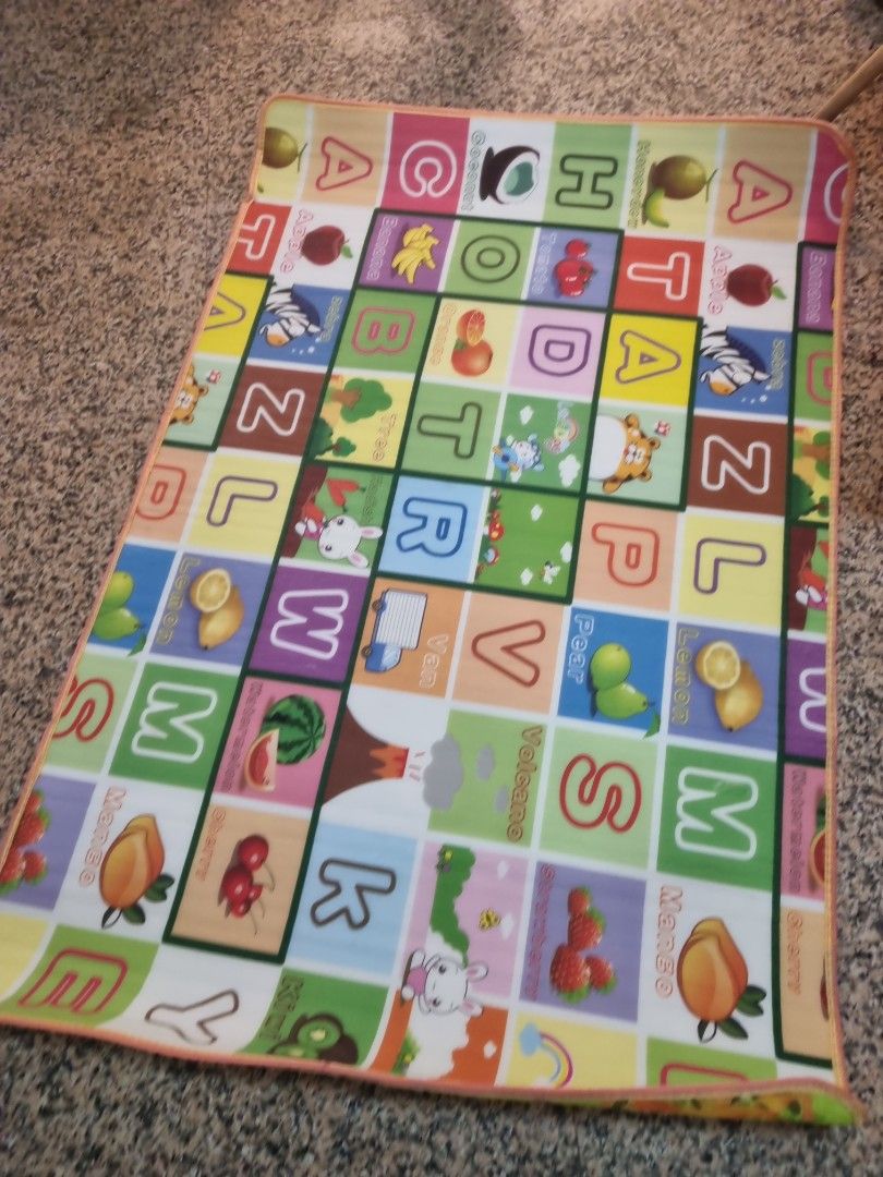 Playmat (Category: Infant Playtime) located in Singapore. Submitted by mannatshe47101 (Listing ID 1374549883, Image 3). Description: a soft cushioned playmat with slight flaw as shown in the picture..