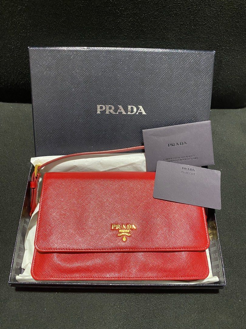 prada wallet on chain (Category: Luxury Bags & Wallets) located in Baguio. Submitted by fullroom.dgs (Listing ID 1374642837, Image 1). Description: prada wallet on chain excellent condition authentic please check photos.