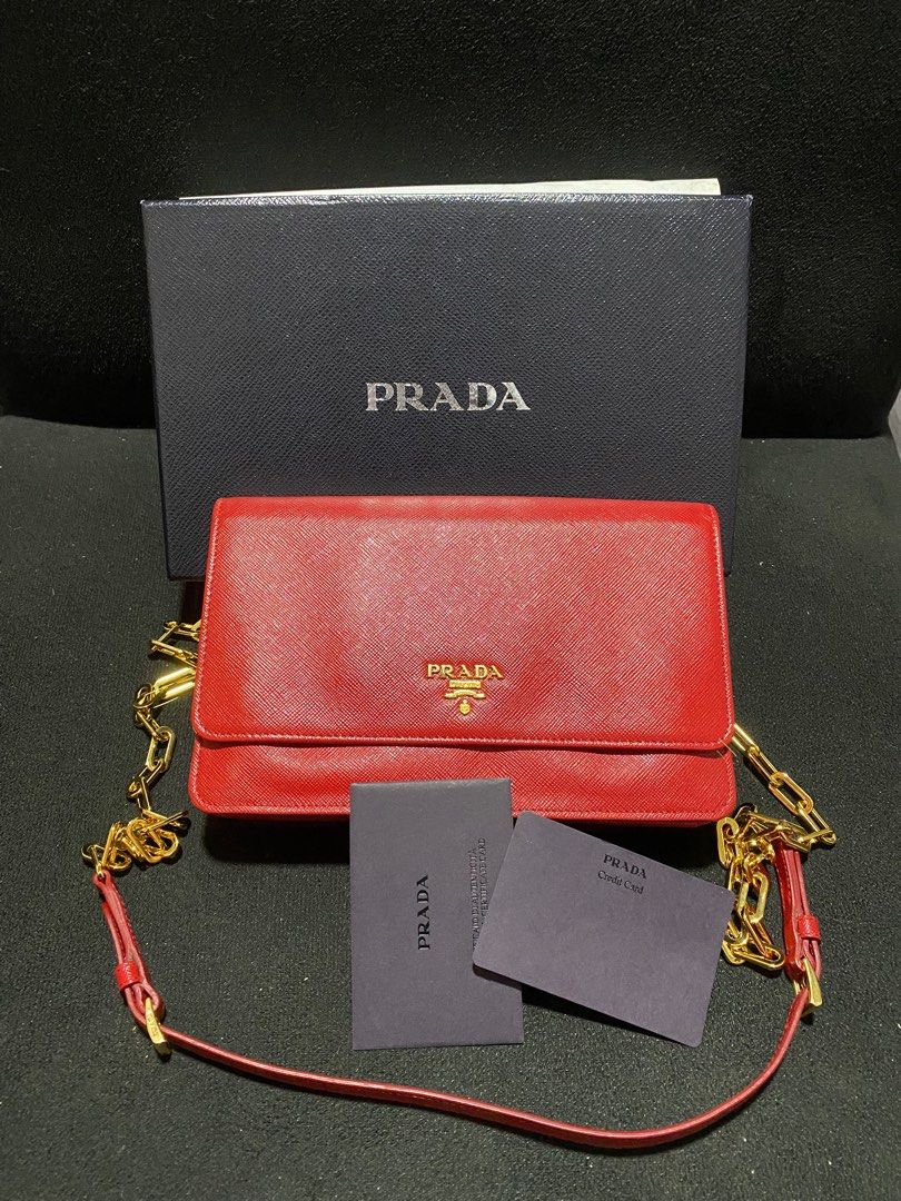 prada wallet on chain (Category: Luxury Bags & Wallets) located in Baguio. Submitted by fullroom.dgs (Listing ID 1374642837, Image 2). Description: prada wallet on chain excellent condition authentic please check photos.