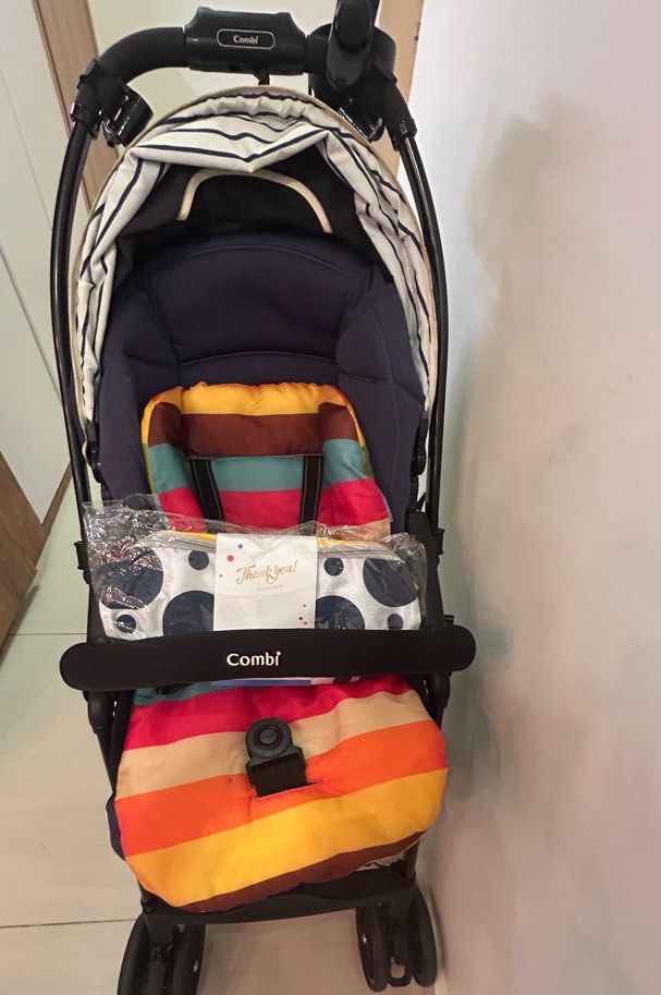 Combi Stroller /Pram (Category: Strollers) located in Singapore. Submitted by miaoqun (Listing ID 1374595907, Image 1). Description: Comes with brand new comforter and pouch as shown in picture .