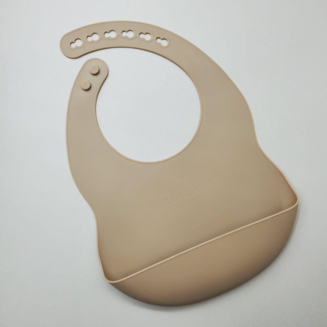 Silicone Bib – Soft, BPA-Free, Adjustable (Brown) (Category: Weaning & Toddler Feeding) located in Singapore. Submitted by reccomart (Listing ID 1374684565, Image 1). Description: 🍼 BUBSY Silicone Baby Bib – Stylish, Mess-Free Mealtimes Make feeding time easier with this soft, flexible, and waterproof bib. Designed to catch every crumb and spill with a deep front pocket, while keeping your baby comfy and clean. ✨ Features: – Food-grade silicone 