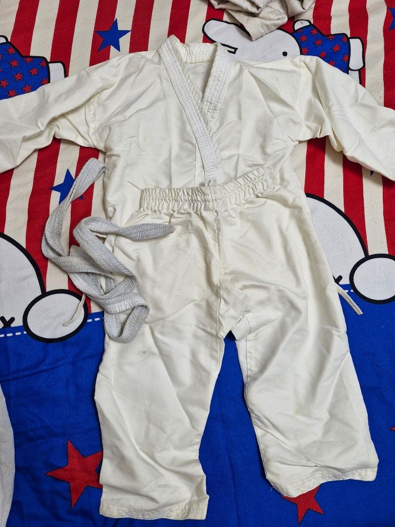 White Karate Uniform (Category: Babies & Kids Fashion) located in Singapore. Submitted by gratefulgu10631 (Listing ID 1374667722, Image 1). Description: Bought this for online class...Used for 2 classes only then joined online & they changed the uniform, so never used. Age : 4 to 6 yrs.