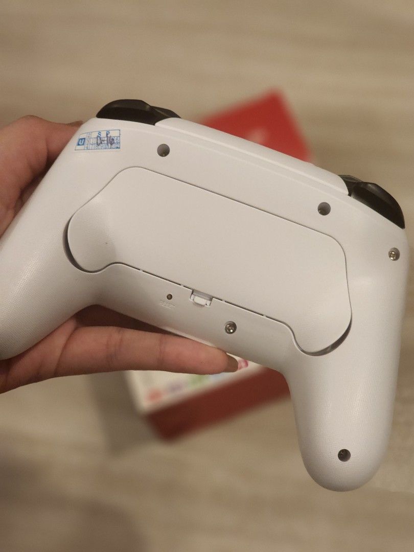 Wireless Bluetooth Gaming Controller | Switch / PC / iOS / Android | With Box (Category: Controllers) located in Calamba. Submitted by keeprees (Listing ID 1374679246, Image 2). Description: Orig price is 500 + shipping opened for testing only : rfs duplicate order from tiktok : tested on both mac and windows pc battery lasts long , buttons are easy to press and good grip and good latency as well..