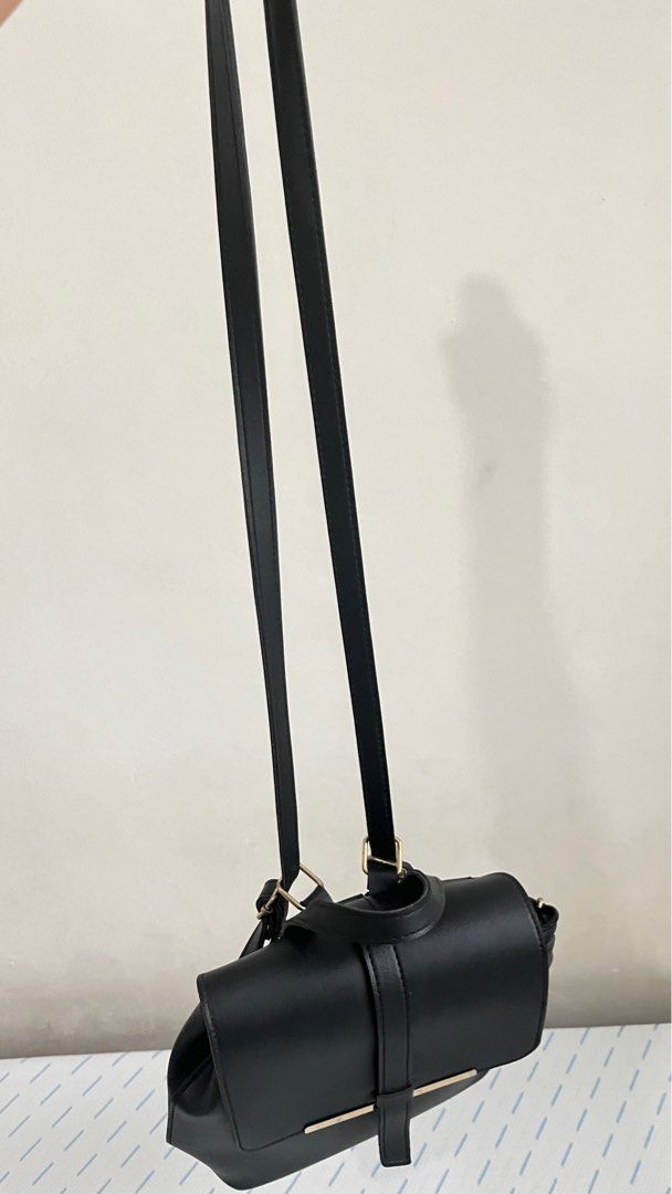 2 way black bag | backpack / crossbody | (Category: Backpacks) located in Makati City. Submitted by declutter.makati (Listing ID 1374724887, Image 3). Description: 📍Makati On hand and ready for pick up SF is c/o by the buyer MOP: Gcash, Unionbank, or Metrobank.