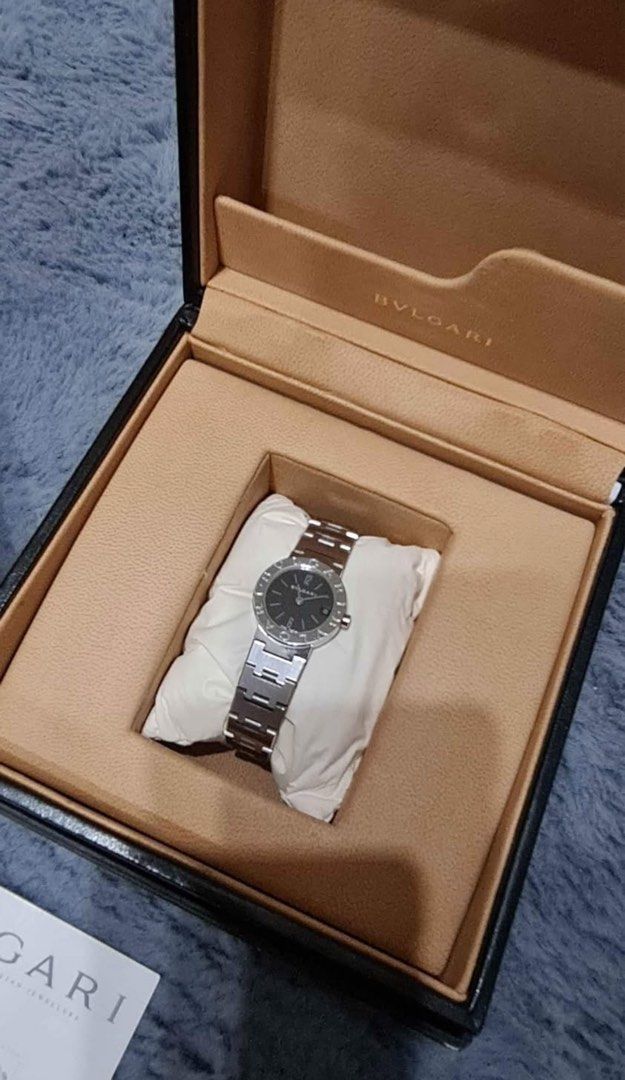 Authentic Bvlgari Watch (Category: Luxury Watches) located in Pasig City. Submitted by shop_preloved_luxe (Listing ID 1374752153, Image 2). Description: Bvlgari SS23 watch, black faced Used but still glossy normal signs of usage like hairline marks. Complete with box, authenticity card, Japan sourced. RFS. Got a bigger watch.