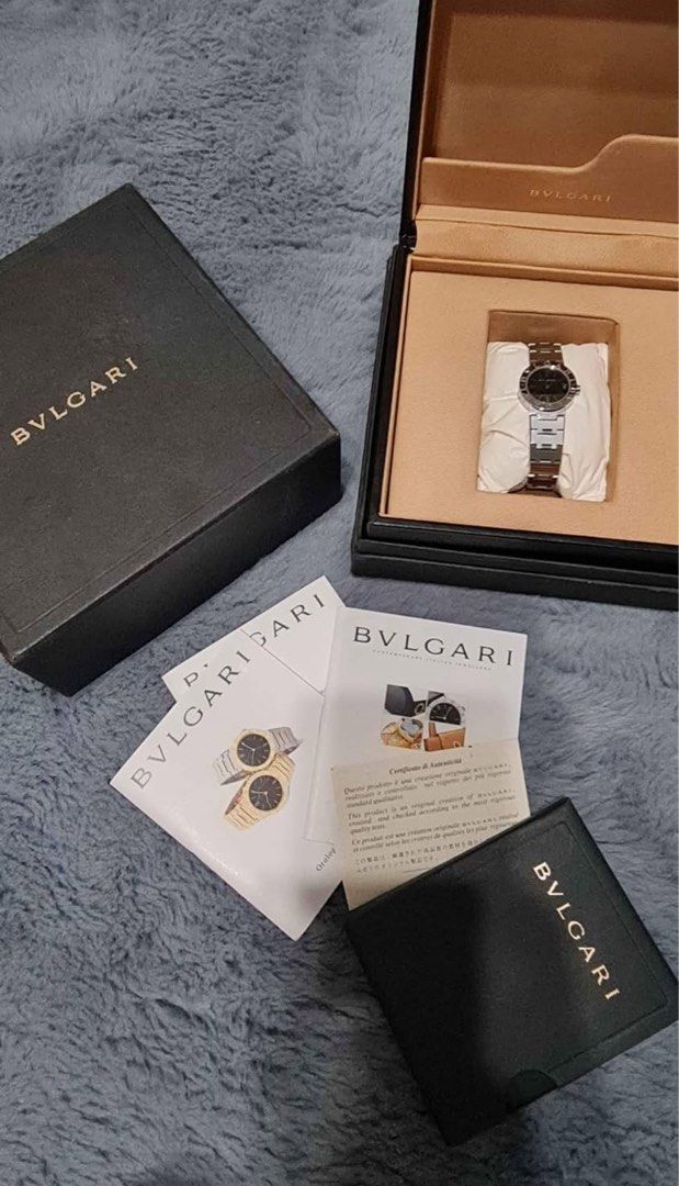 Authentic Bvlgari Watch (Category: Luxury Watches) located in Pasig City. Submitted by shop_preloved_luxe (Listing ID 1374752153, Image 3). Description: Bvlgari SS23 watch, black faced Used but still glossy normal signs of usage like hairline marks. Complete with box, authenticity card, Japan sourced. RFS. Got a bigger watch.